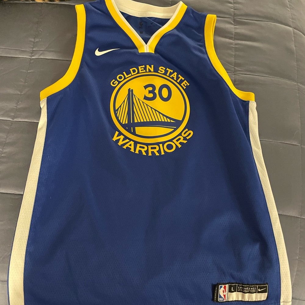 Golden State home Kids Steph Curry Jersey size Large.